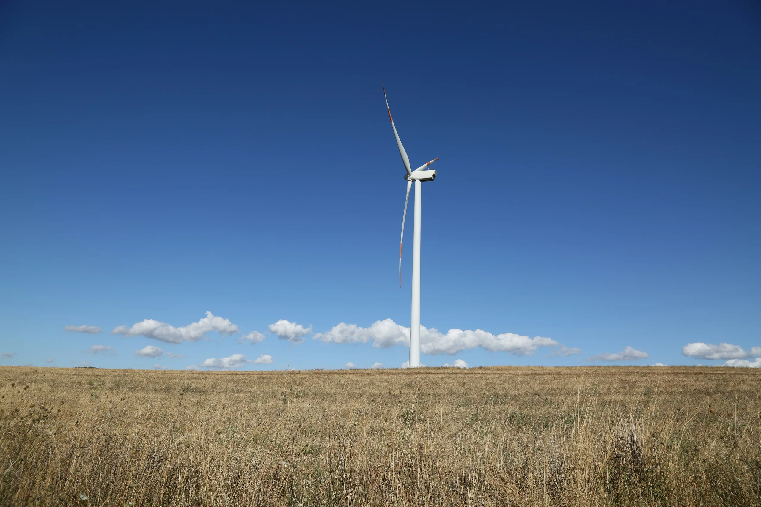 Wind turbine in a bright rural landscape