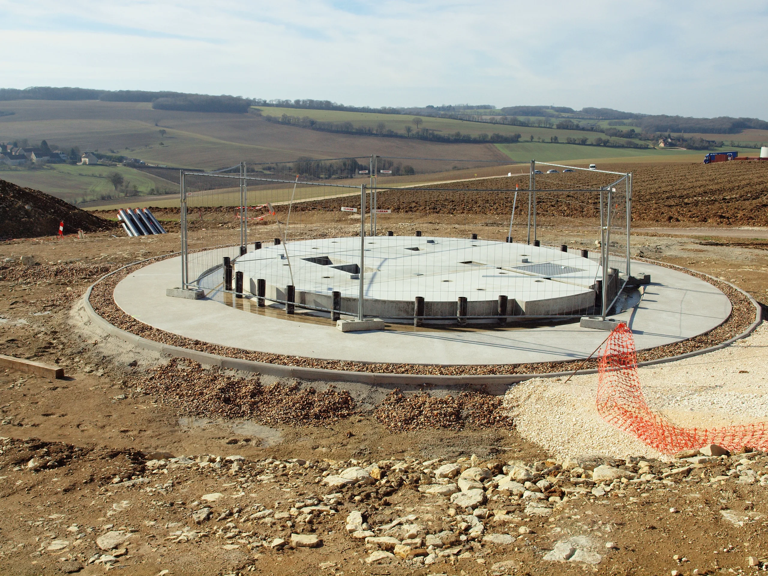 General wind-turbine foundation construction in a rural landscape